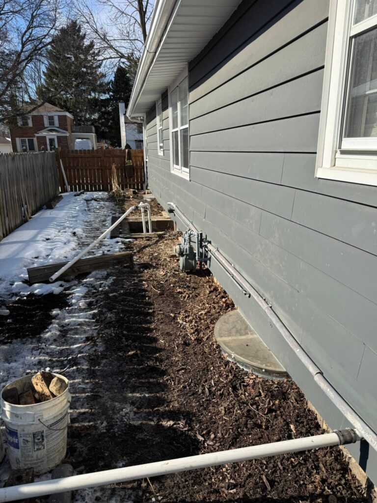 Exterior basement waterproofing and drainage installation in Mount Prospect, IL